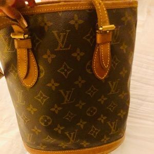 authentic vintage Luis Vuitton bucket bag.